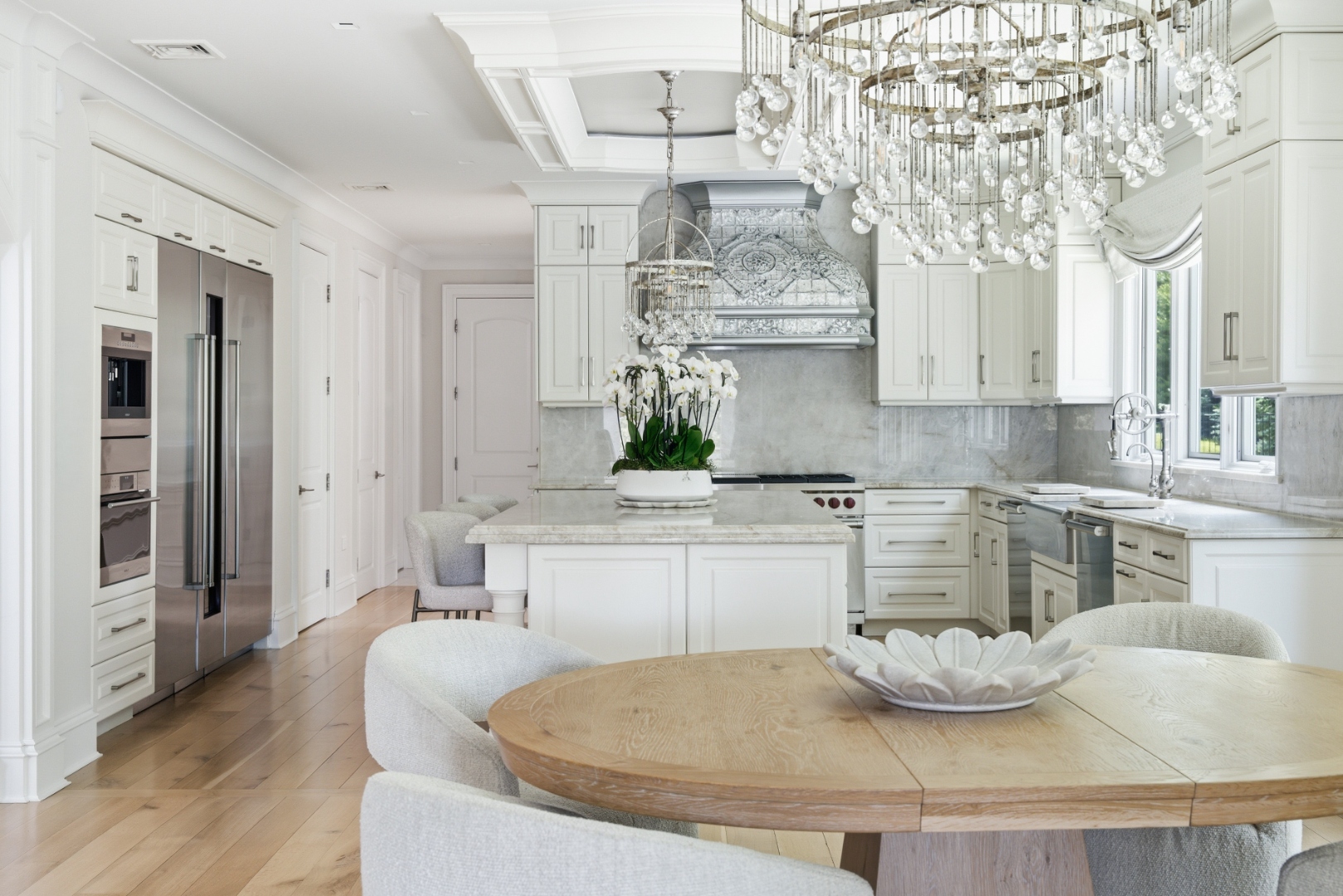 Kitchen — Wolf range and ornate range hood