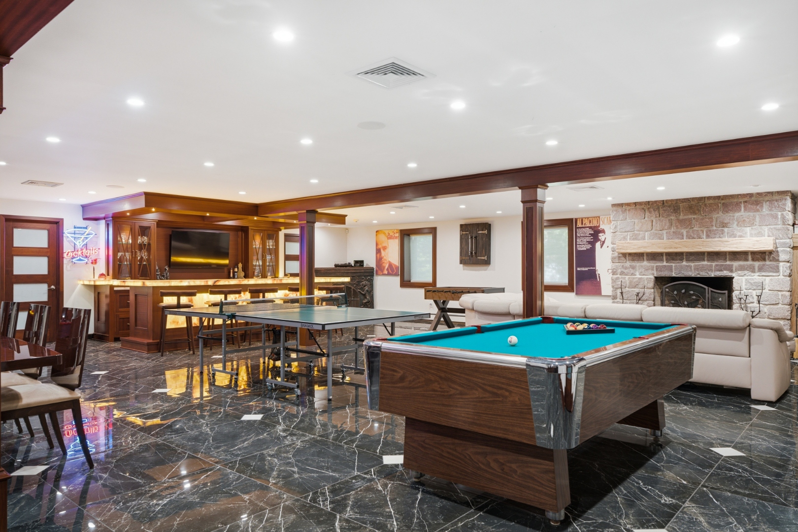 Lower level — illuminated onyx bar with copper sink