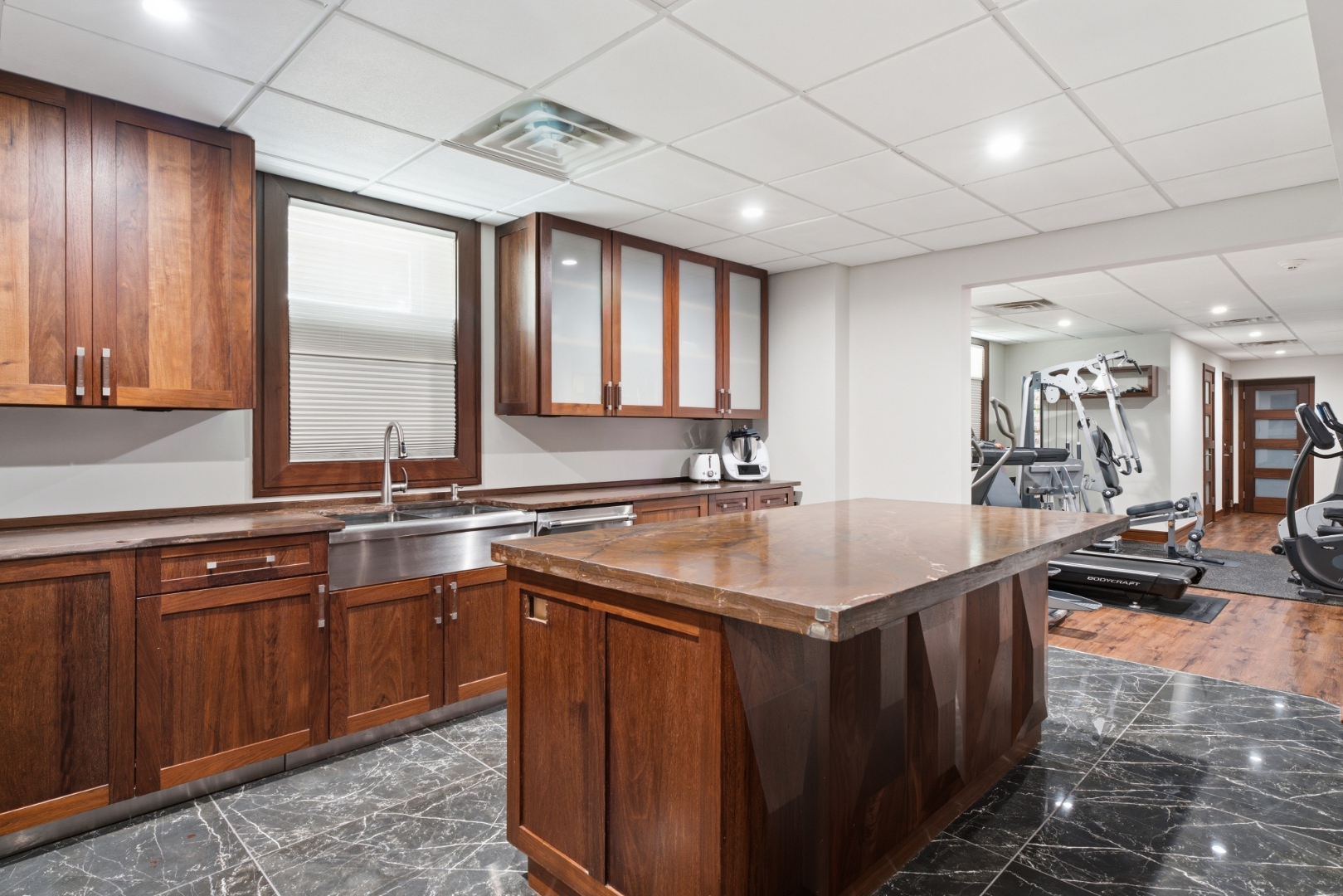 Lower level — natural stone fireplace