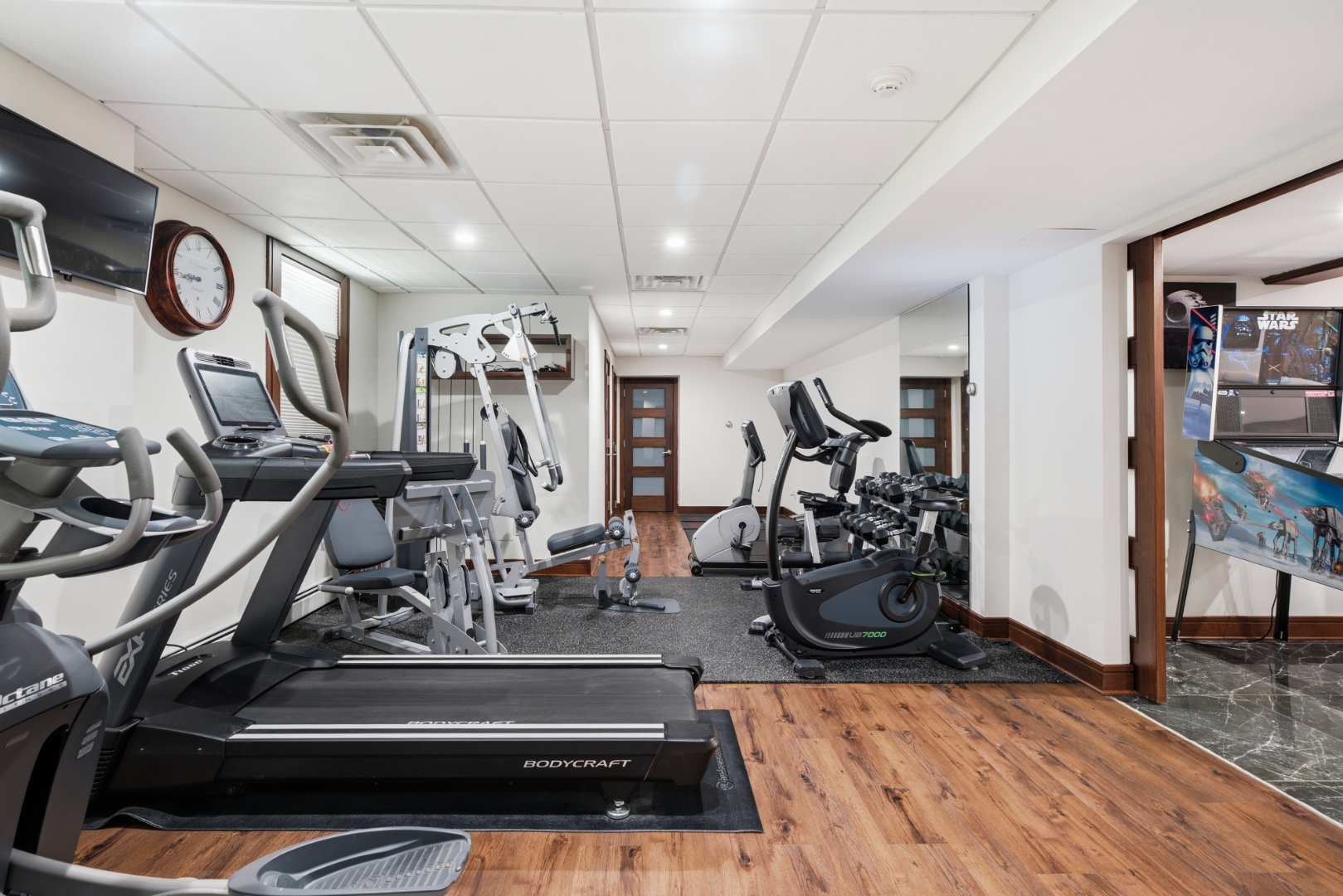 Lower level — fitness and entertainment space